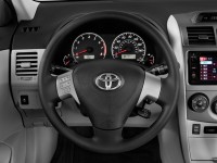 2013-toyota-corolla-4-door-sedan-auto-le-natl-steering-wheel