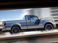 2014-ford-f-150-tremor-passengers-side-view-in-motion