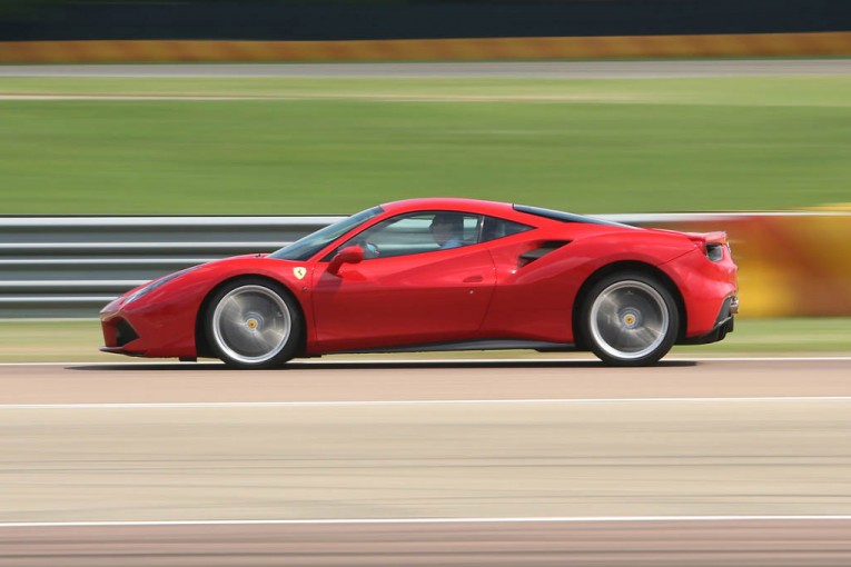 2016-ferrari-488-gtb-side-profile-in-motion-05