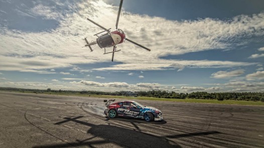 Aerobatic Helicopter Chases Drifting Race Car