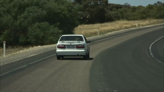 283296732-median-strip-curve-form-country-road-car-ride