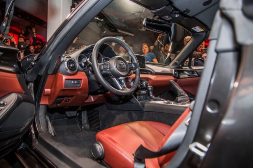 2017-Mazda-MX-5-Miata-RF-on-stage-interior-with-door-open