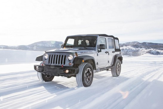 2016-Jeep-Wrangler-Unlimited-Rubicon-Hard-Rock-front-three-quarter-in-motion