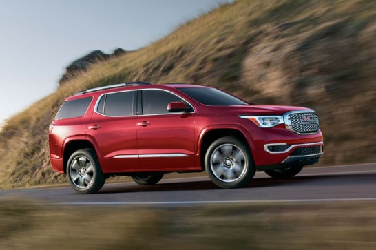 2017-GMC-Acadia-Denali-front-three-quarter-motion