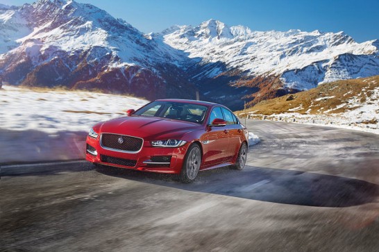 2017-Jaguar-XE-AWD-front-three-quarter-in-motion-02