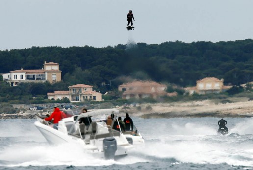 Pilot and jet-ski champion Franky Zapata hovers in the air on an IPU Flyboard Air hoverboard as he breaks the Guiness World Records for furthest flight by hoverboard in Sausset les Pins near Marseille, France