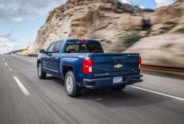 2016-Chevrolet-Silverado-LTZ-Z71-4x4-rear-three-quarter-in-motion