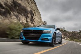 2016-Dodge-Charger-SXT-front-three-quarter-in-motion-03