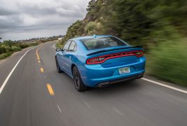 2016-Dodge-Charger-SXT-rear-three-quarter-in-motion