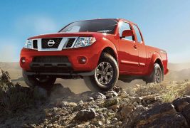 2016-nissan-frontier-off-roading-lava-red-large