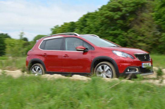 2016-Peugeot-2008-side-in-motion