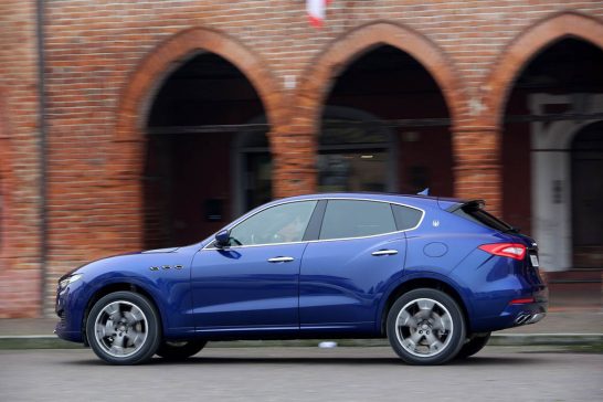 2017-Maserati-Levante-rear-side-in-motion-02
