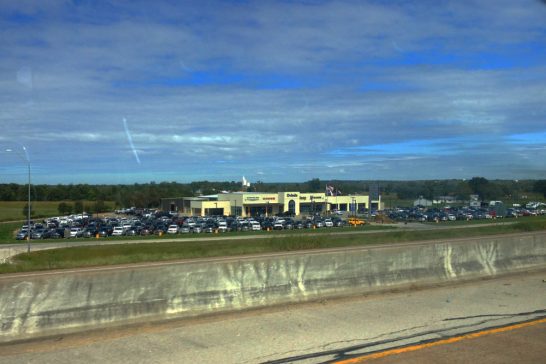 Chrysler_Dodge_Jeep_RAM-dealership-USA-street_scene-2015