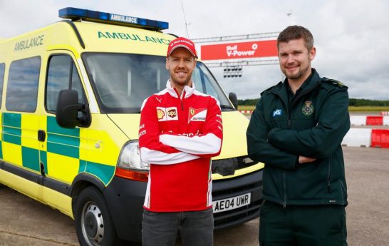 Sebastian-Vettel-With-Ambulance-And-Driver-2