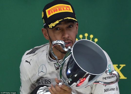 lewis_hamilton_claimed_victory_in_a_rain_hit_brazilian