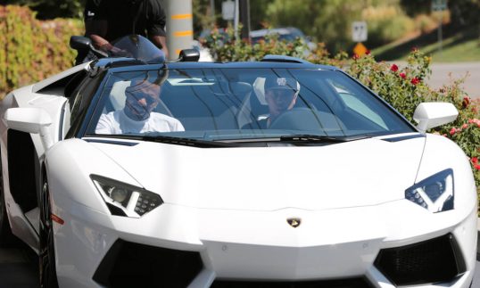**EXCLUSIVE** Rapper Tyga fills up his Lamborghini at a gas station in Calabasas