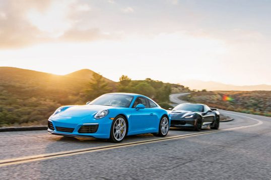 2017-chevrolet-corvette-grand-sport-vs-2017-porsche-911-carrera-s-front-three-quarter-in-motion