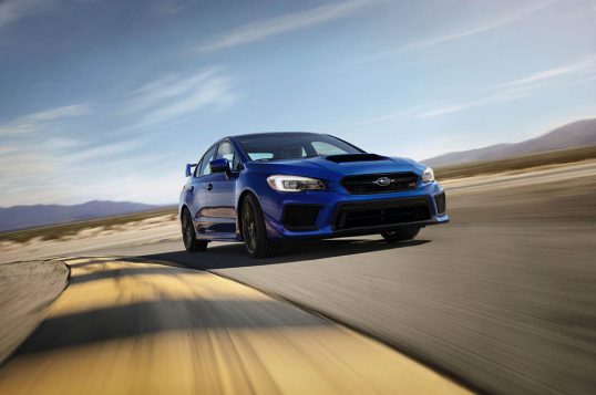 2018-subaru-wrx-sti-front-three-quarters-in-motion