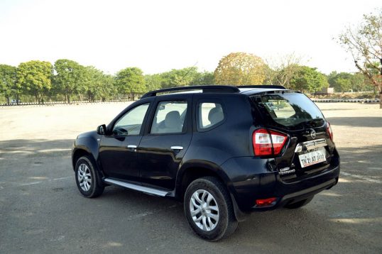 nissan-terrano-petrol-review-images-black-rear-angle-action