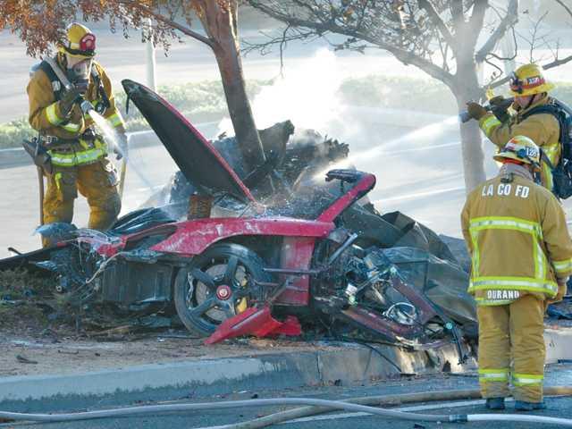 http://www.pedal.ir/wp-content/uploads/Paul-Walker-fatal-accident-in-Porsche-Carrera-GT.jpg