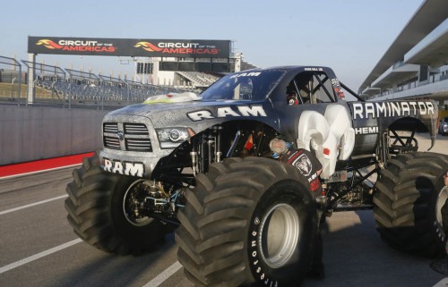 RAMINATOR driver Mark Hall prepares to attempt setting a new GUINNESS WORLD RECORDS record for Fastest Speed for a Monster Truck at Circuit of the Americas Speedway, on Monday, Dec. 15, 2014 in Austin, Texas. Hall reached a speed of 99.1 mph to break the 2012 record of 96.8 mph. (Photo by Jack Plunkett/Invision for Ram Truck brand, Chrysler Fiat Automobiles/AP Images)