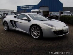 damaged mclaren mp4-12c in the netherlands