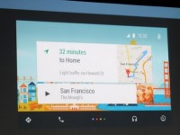 A presenter demonstrates Android Auto