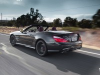 2013-Mercedes-Benz-SL63-AMG-rear-three-quarters-in-motion