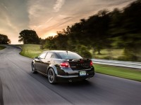 2013-dodge-avenger-rear-view-in-motion-02