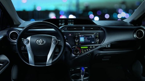 2014-Toyota-Prius-C-Hybrid-Hatchback-USA-car-dashboard-interior-panel