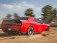 2015-dodge-challenger-rt-scat-pack-rear-three-quarters-in-motion