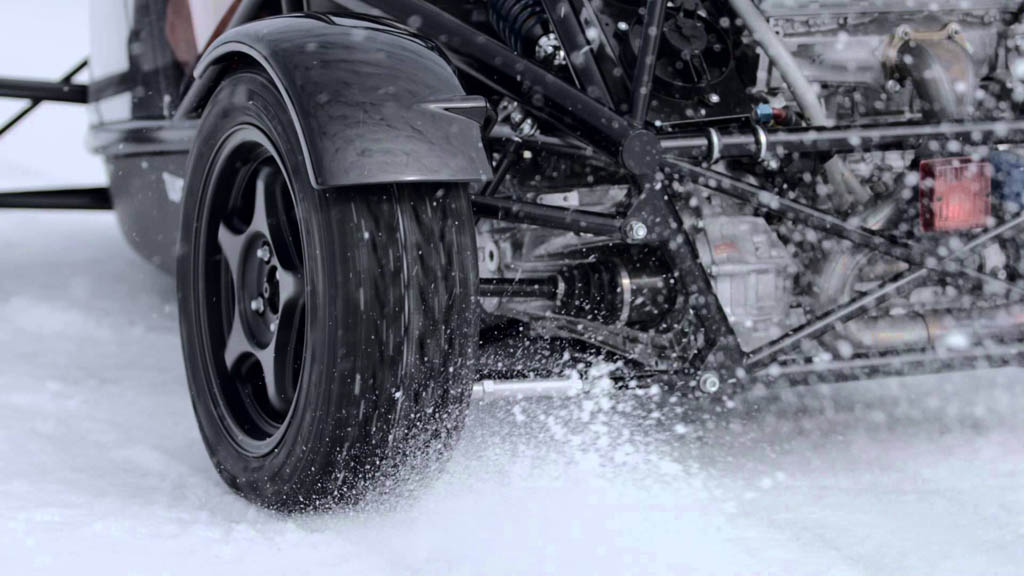 ariel-atom-on-studded-tires-takes-on-snowmobile