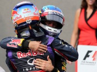 A congratulatory hug from team-mate Sebastian Vettel