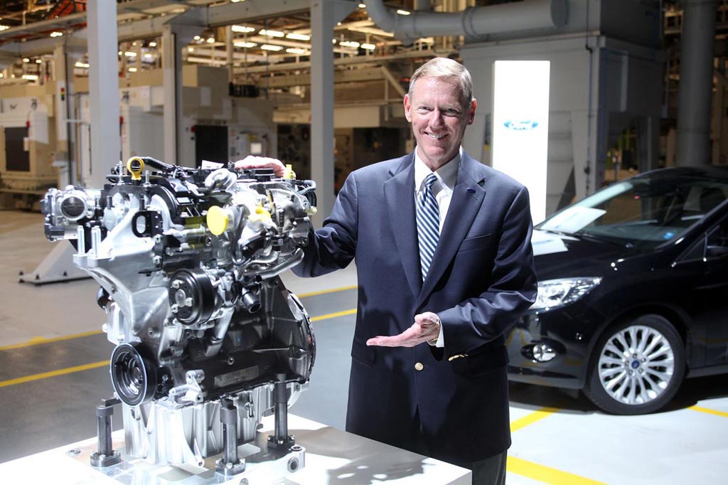 Ford CEO Alan-Mulally with 1.0 liter EcoBoost engine