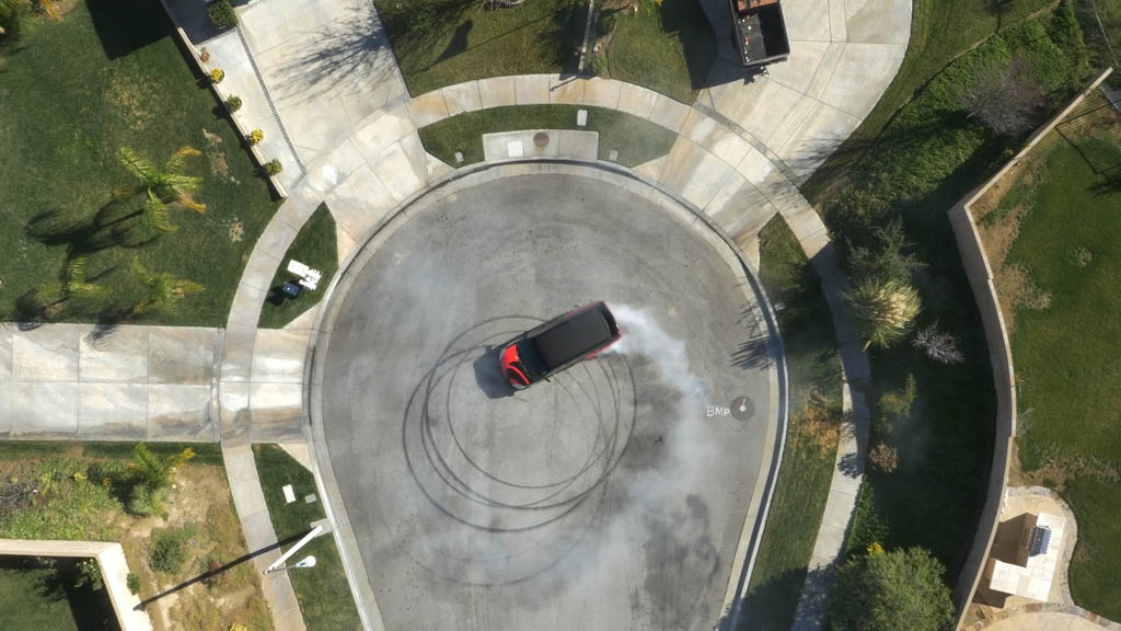 Mom and Kids Drifting in a Minivan